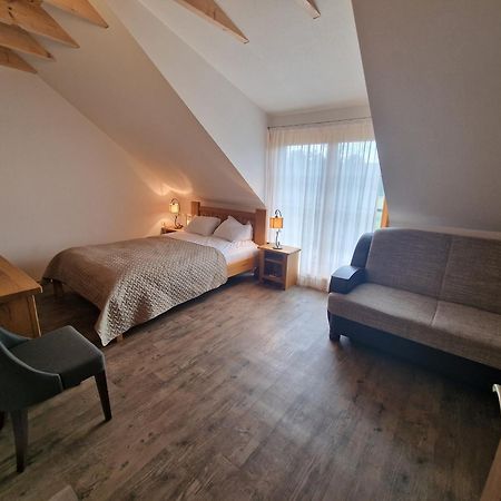 Roksala Guest House Taruciai Bagian luar foto