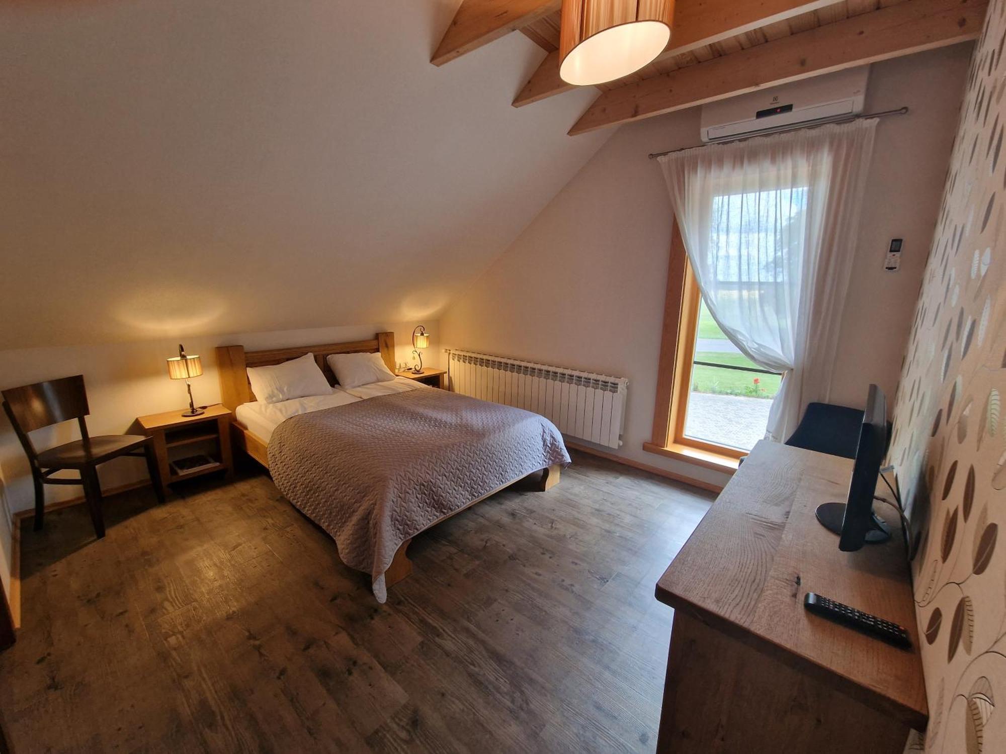 Roksala Guest House Taruciai Bagian luar foto